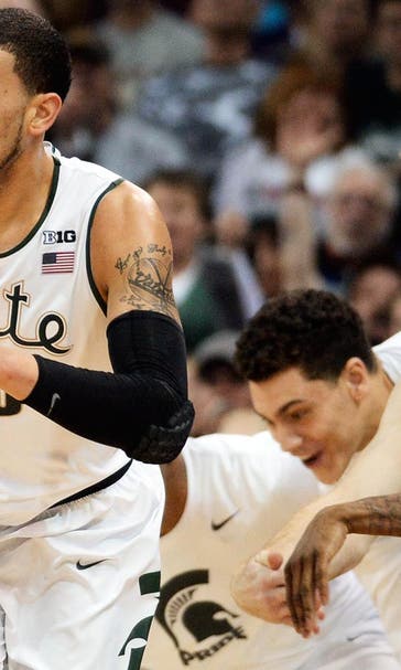 Michigan State holds off Harvard behind Branden Dawson's career night